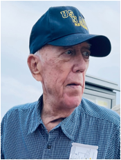 A person wearing a blue hat
Description automatically generated