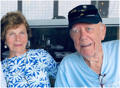 A person and person sitting together
Description automatically generated